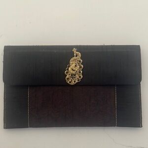 Elegant Black and Brown Clutch with Gold Accent